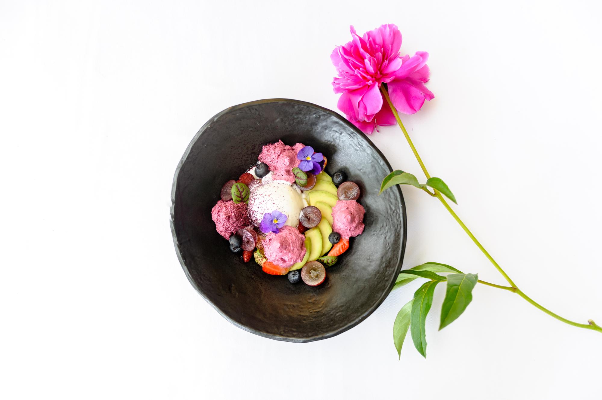 plated dessert with edible flowers